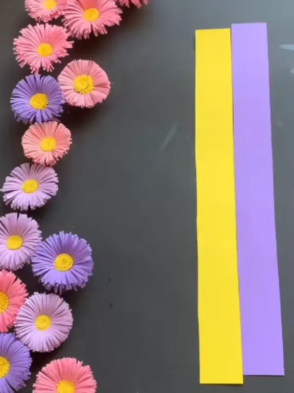 18 Craft Ideas For Paper Flowers You Can Make in Minutes 3 Mixed Pastel Fringe Daisies