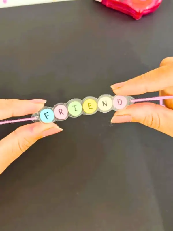 17 Easy Best Friend Craft Ideas Your Bestie Will Actually Keep 7 No Beads Needed "FRIEND" Paper Bracelet