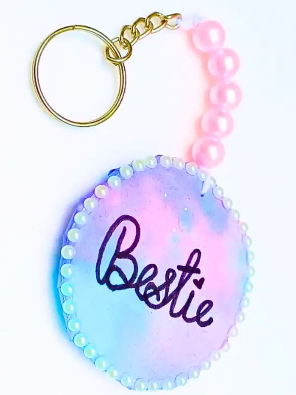 17 Easy Best Friend Craft Ideas Your Bestie Will Actually Keep 5 Watercolor "Bestie" Keychain With Pearl Trim