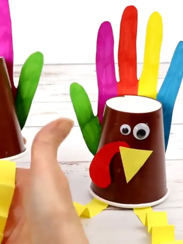 17 Creative Thanksgiving Craft Ideas For Kids To Make This Year 9 Paper Cup Handprint Turkey