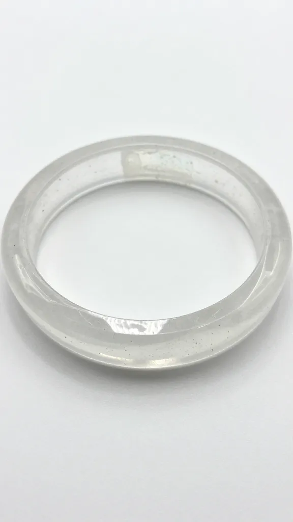 How to Make Resin Bracelets at Home 2 Close-up of clear epoxy resin bracelet mold with glitter