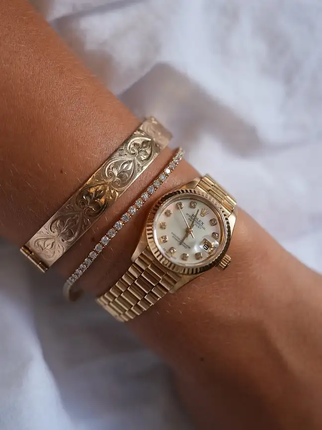 17 Vintage Bracelet Ideas for Stacking, Layering, and Wearing Solo 4 Engraved Cuff, Diamond Line, and Gold Watch Stack