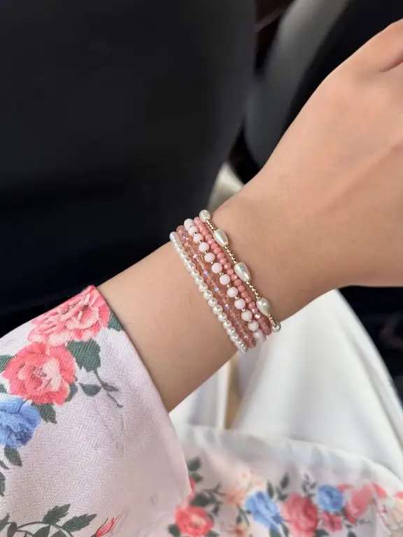 20 Cute Friendship Bracelet Ideas (Beaded, Woven, and Charm Styles) 5 Pearl and Coral Beaded Stack