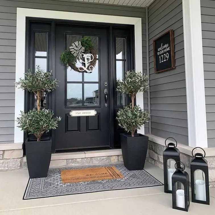 16 Minimalist Front Porch Ideas That Look Expensive on a Budget 4 Matching Olive Trees on Both Sides of the Door