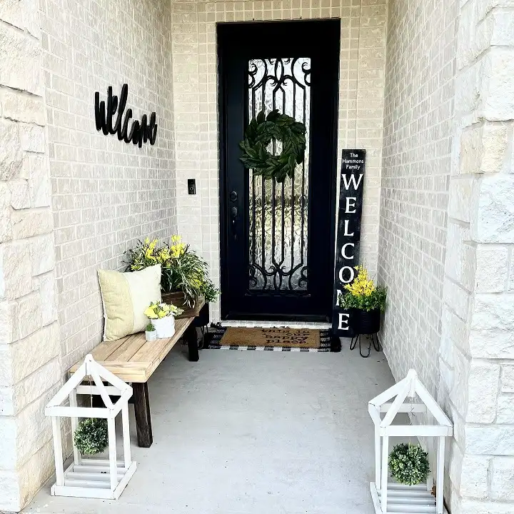 16 Minimalist Front Porch Ideas That Look Expensive on a Budget 6 A Slim Bench and DIY Wood Lanterns for a Narrow Entry
