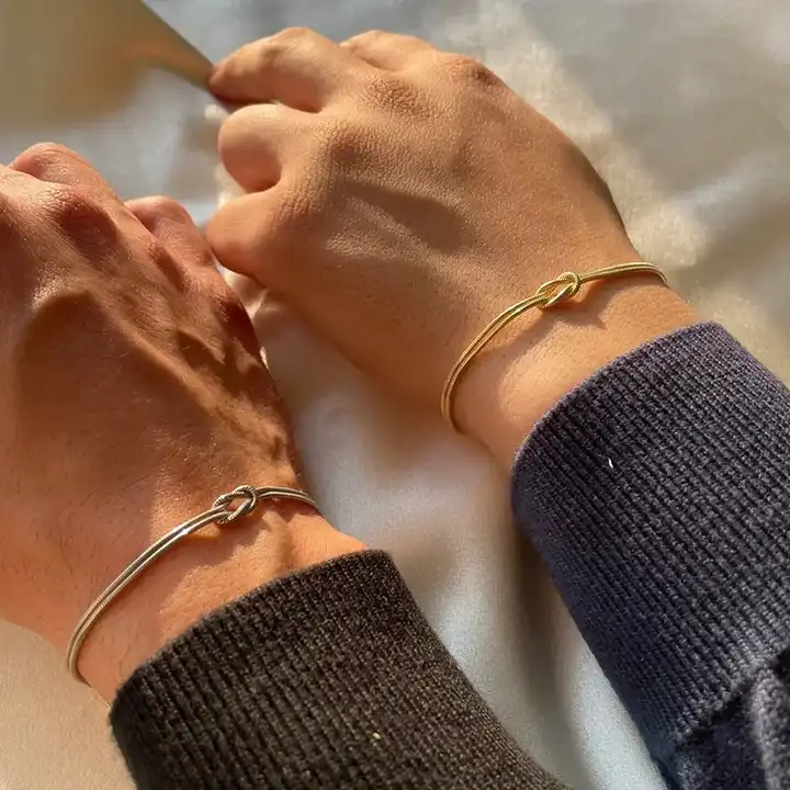 12 Minimalist Friendship Bracelet Ideas Your Friends Will Actually Wear 3 Knot Cuffs in Two Different Metals