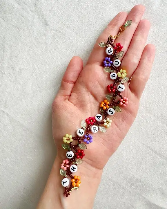 20 Cute Friendship Bracelet Ideas (Beaded, Woven, and Charm Styles) 4 Floral Vine Charm Bracelet with Letter Beads