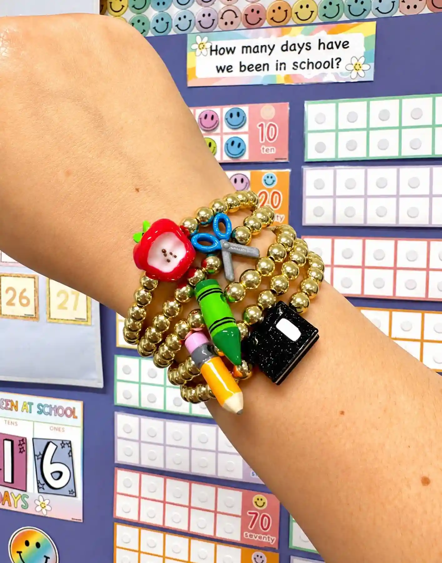 15 Back to School Bracelet Ideas to Trade 7 5. Gold Bead Bracelets Loaded With Tiny School Supply Charms