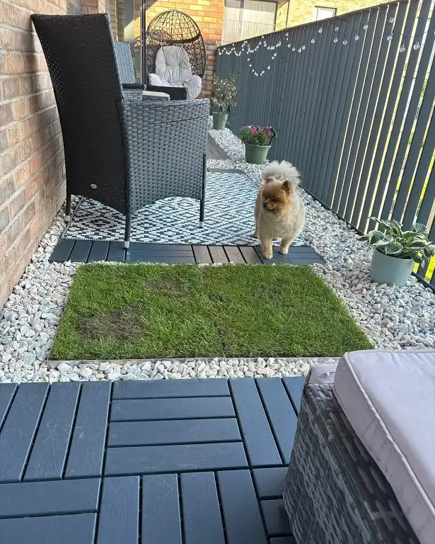 Zoned Layout With Deck Tiles and Pebbles