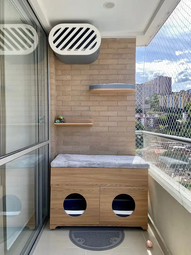 15 Small Balcony Ideas For Pet Owners 3 2. Build a Cubby Bench That Doubles as a Litter Box Hideaway