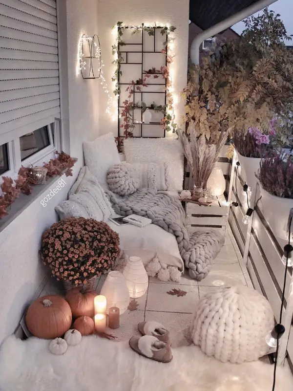 Cozy Fall Balcony Decor: 14 Ideas for Small Spaces 3 1. Skip the Furniture and Build the Seat on the Floor