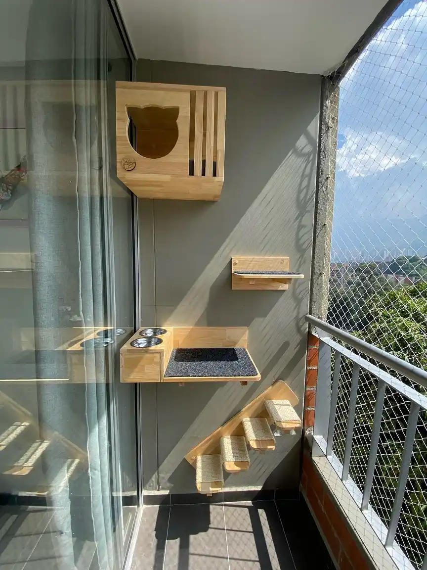 15 Small Balcony Ideas For Pet Owners 4 3. Combine a Feeding Station With the Climbing Wall