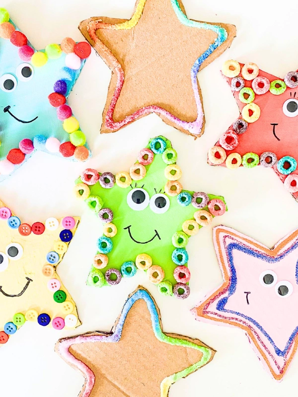 Cardboard Stars Edged With Buttons, Pom Poms and Cereal