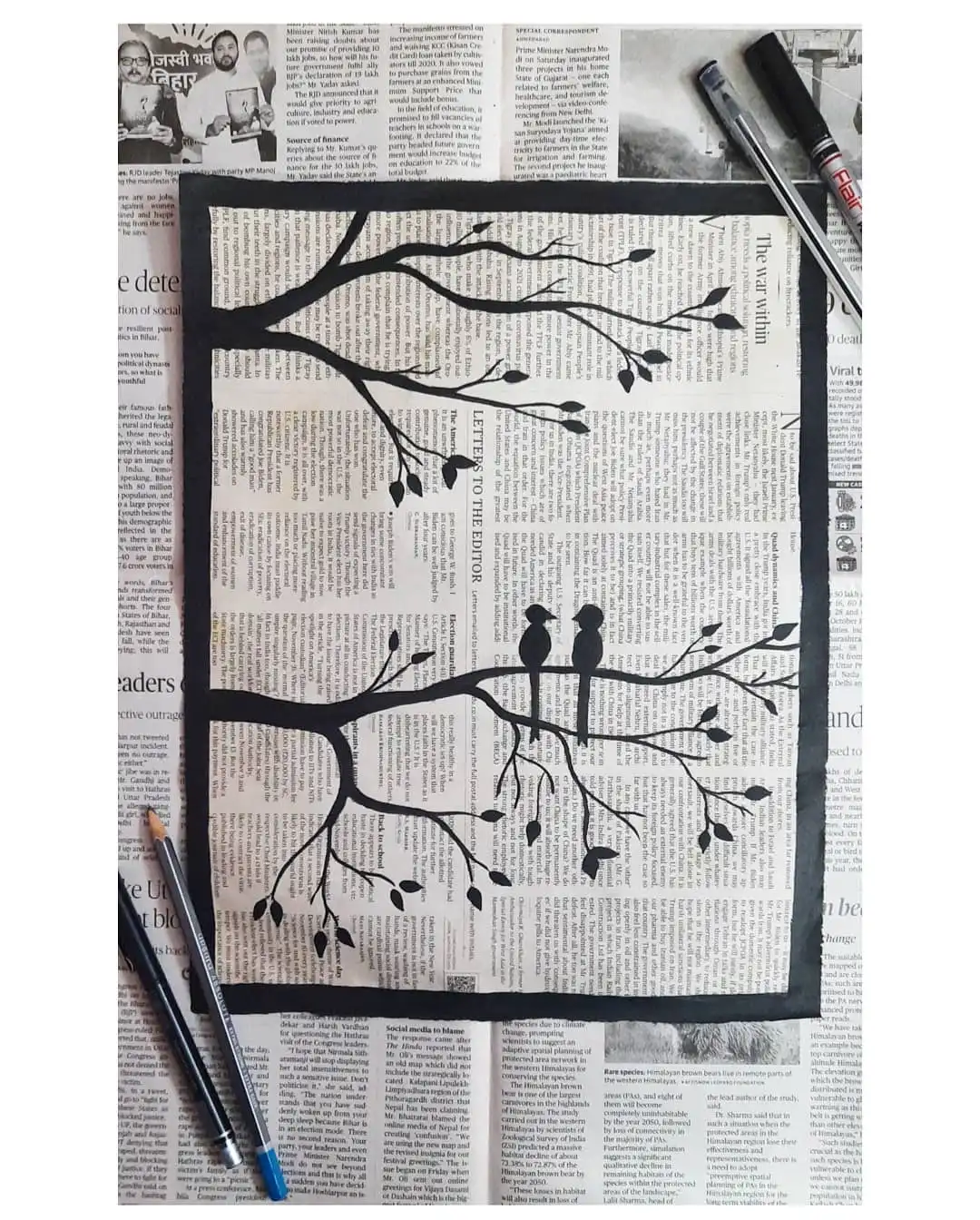 14 Newspaper Craft Ideas for Preschoolers: Roosters, Hats, Tiny Towns and More 5 Handprint Tree Silhouette on a Newspaper Page